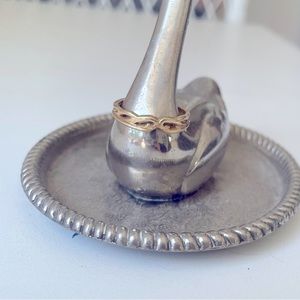 14k gold pinky ring.